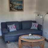 Wohnnküche - Couch mit Tisch